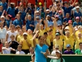 LIVERPOOL, ENGLAND - Tuesday, June 16, 2009: Laura Robson (GBR) throws a ball into the crowd to pick a school child to play a point on centre court during a special Kids Day before that start of the Tradition ICAP Liverpool International Tennis Tournament 2009 at Calderstones Park. (Pic by David Rawcliffe/Propaganda)