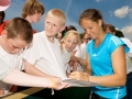 LIVERPOOL, ENGLAND - Tuesday, June 16, 2009: Laura Robson (GBR) signs autographs for fans after playing an exhibition match in front of 3,000 school children during a kids day at the Tradition ICAP Liverpool International Tennis Tournament 2009 at Calderstones Park. (Pic by David Rawcliffe/Propaganda)